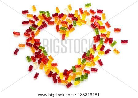 heart shape made of colorful gummy bears isolated with small shadow on a white background love concept for birthday valentines or mothers day