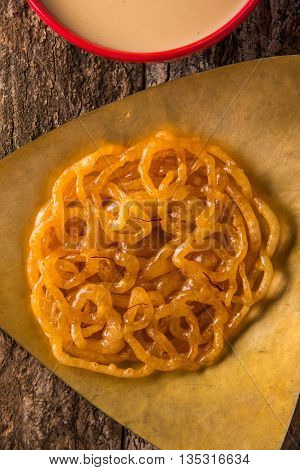 jalebi or imarati with rabdi made from condensing milk, famous dessert sweet from India