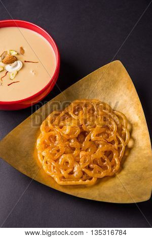 jalebi or imarati with rabdi made from condensing milk, famous dessert sweet from India