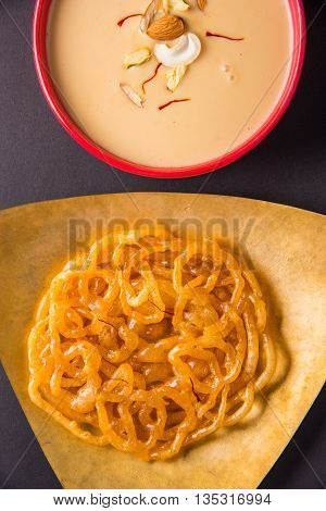 jalebi or imarati with rabdi made from condensing milk, famous dessert sweet from India