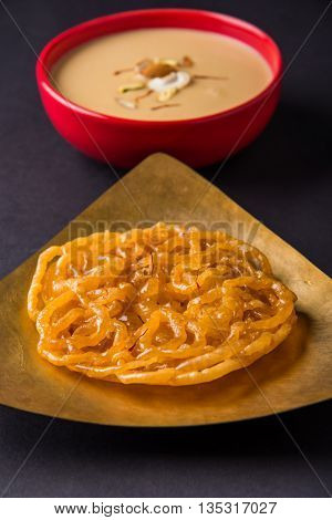 jalebi or imarati with rabdi made from condensing milk, famous dessert sweet from India