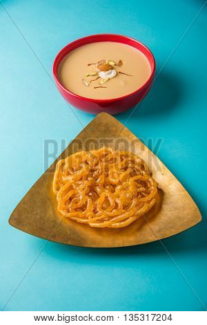 jalebi or imarati with rabdi made from condensing milk, famous dessert sweet from India