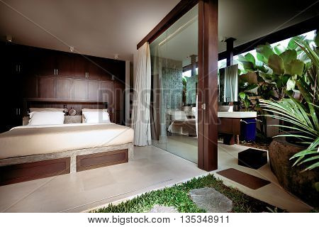 Wooden Decorated Bedroom Attached To The Outside Area