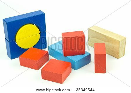 Wooden colorful bricks isolated on white background. Wooden toy building blocks