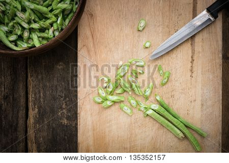 Stil Life Yardlong Bean Slice On Chopping Board Wood.