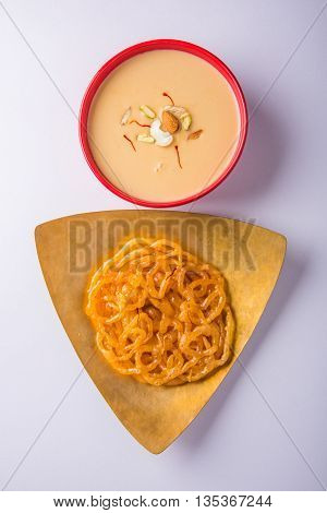 jalebi or imarati with rabdi made from condensing milk, famous dessert sweet from India