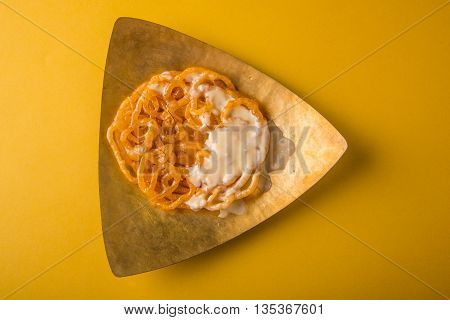 jalebi or imarati with rabdi made from condensing milk, famous dessert sweet from India