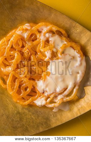 jalebi or imarati with rabdi made from condensing milk, famous dessert sweet from India