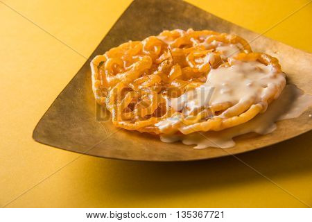 jalebi or imarati with rabdi made from condensing milk, famous dessert sweet from India