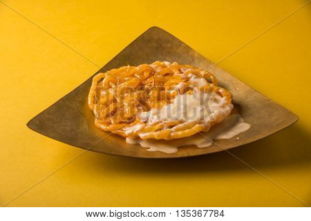 jalebi or imarati with rabdi made from condensing milk, famous dessert sweet from India