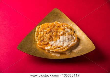 jalebi or imarati with rabdi made from condensing milk, famous dessert sweet from India