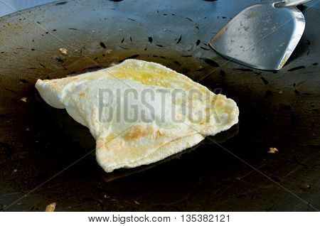 business man make indian food gourmet Southern Flat Bread Fry Pan rotee