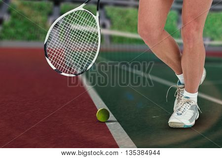 Composite image of athlete playing tennis in a stadium