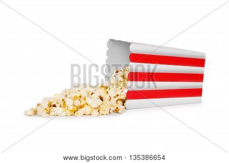 Popcorn in striped bucket on white background