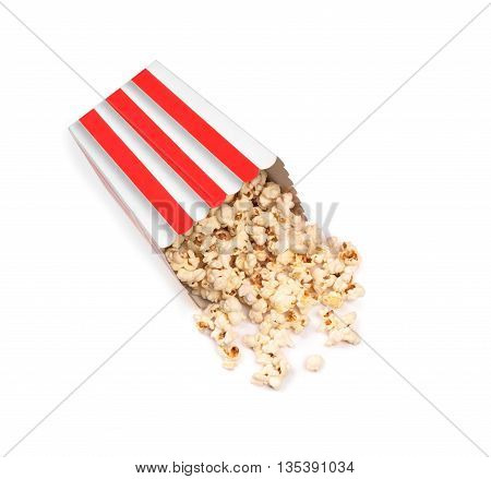 Popcorn in striped bucket on white background