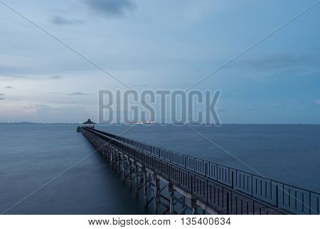 jetty at the beach when sunset golden hours