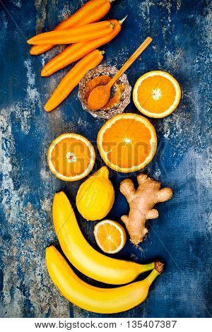 Carrot ginger immune boosting anti inflammatory smoothie with turmeric and honey. Detox morning juice drink clean eating