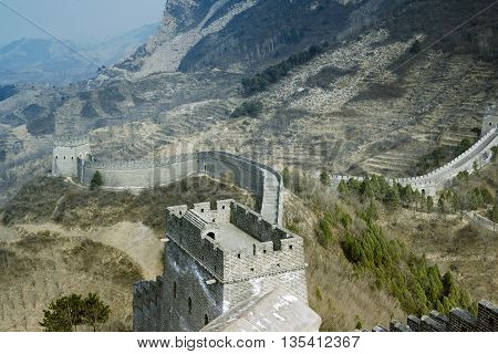 The Great Wall of China over mountains in Beijing, China.