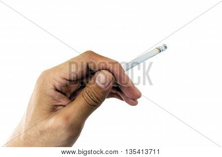 Focus at cigarette in hand with burred of choldrens background;Concept for World No Tobacco Day.
