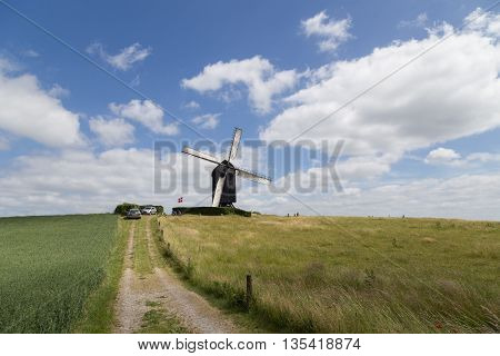 Hoejerg, Denmark - June 19, 2016: Historic Danish windmill called Pibe Moelle on the Danish Windmill Day 2016.