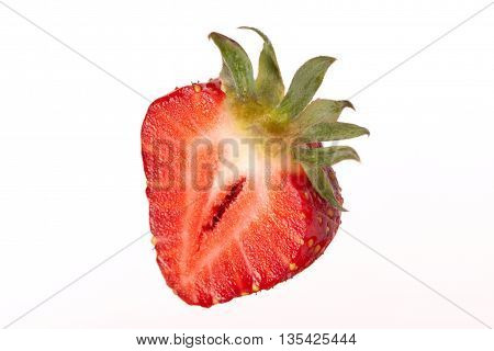 Half Of Strawberry Isolated On White Background
