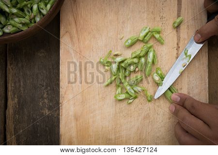 Stil Life Yardlong Bean Slice On Chopping Board Wood.