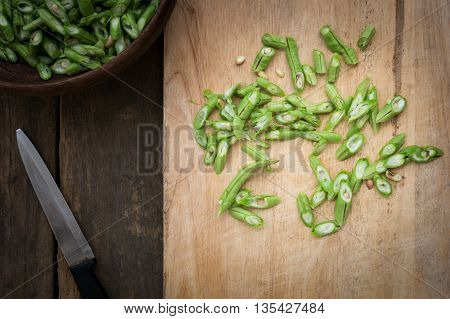 Stil Life Yardlong Bean Slice On Chopping Board Wood.