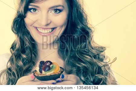 Smiling Cute Woman Holds Fruit Cake In Hand