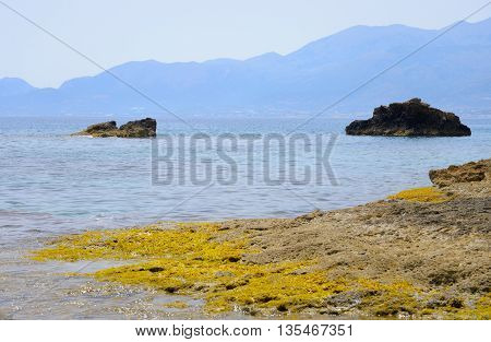 Rocks on the coast of Cretan Sea near Hersonissos Crete Greece.