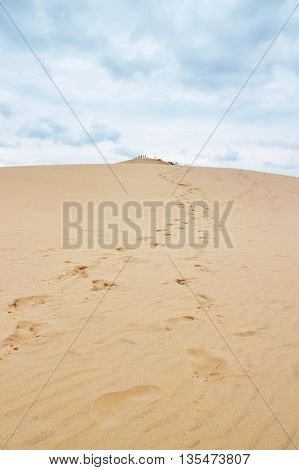 Footsteps leading to the top of Dune of Pilat (Dune du Pilat) the tallest sand dune in Europe located in the Arcachon Bay area France.