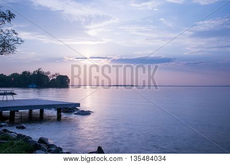 View of lake at the cottage during a beautiful sunset