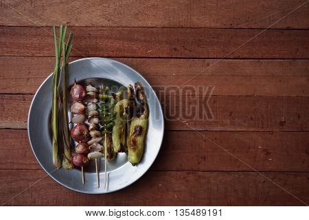 grilled pepper red onion garlic and lemongrass for prepare the Thai chili paste
