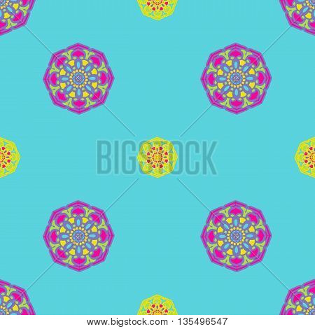 Bright blue, yellow and pink abstract background. Mandala-like shapes.