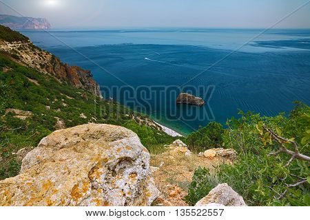 The coast at the cape Fiolent. The top view on the sea and rocks of the cape Fiolent. Crimea
