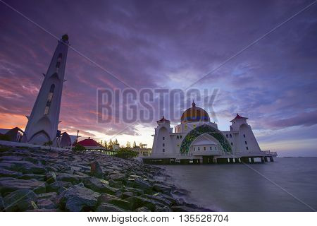 Majestic view of Malacca Straits Mosque during sunset.