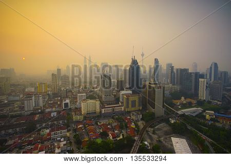 Smoke from forest fires in Indonesia blows across the Malay Peninsula causing haze in Kuala Lumpur