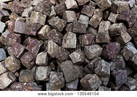 Background of old paving blocks. Repair road.