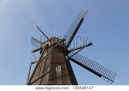 Brede, Denmark - June 23, 2016: The historic Fuglevad windmill in the Frilands Museum.