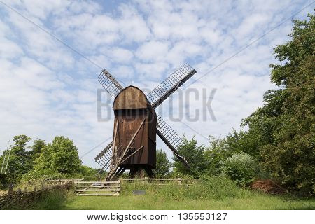 Brede, Denmark - June 23, 2016: A historic windmill in the Frilands Museum.