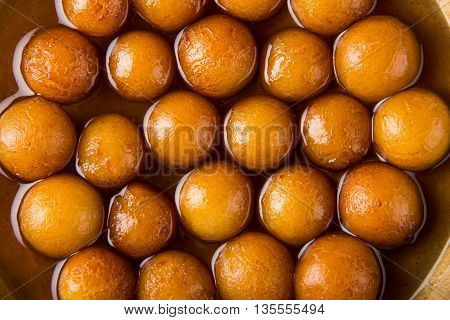 Gulab jamun, or gulaab jamun, is a milk-solids-based sweet mithai