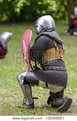 knight in armor in a medieval reenactment