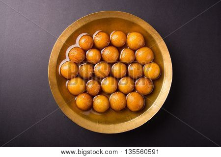 Gulab jamun, or gulaab jamun, is a milk-solids-based sweet mithai