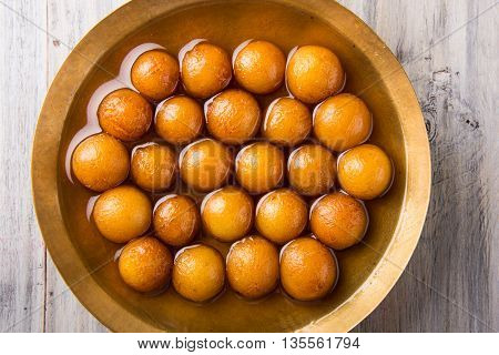 Gulab jamun, or gulaab jamun, is a milk-solids-based sweet mithai