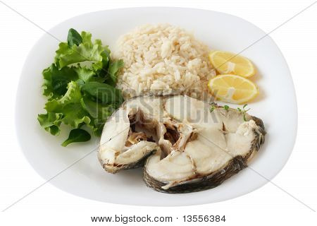 Kokt fisk med ris och citron