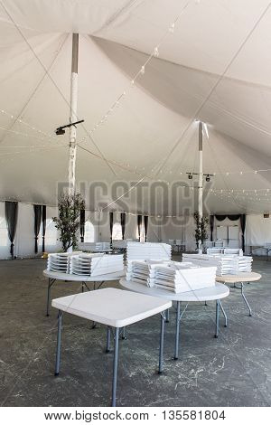 Inside A Large White Tent For Entertaining