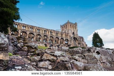 Upward view of the ruins of Jedburgh Abbey in the Scottisch Borders region in Scotland