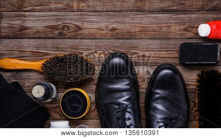 Shoe wax, brush and boot