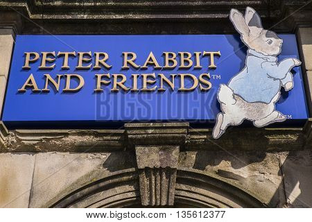 CUMBRIA UK - MAY 29TH 2016: A sign for the Peter Rabbit and Friends Gift Shop in Bowness-on-Windermere in the Lake District on 29th May 2016.