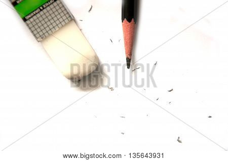 One pencil and one eraser on white background