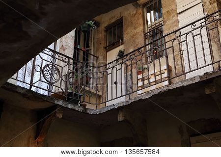LYON, FRANCE - MAY 24, 2015: Traboule is a pedestrian passage through the quarter allowing to get from one street to another. It's view of inside the traboule's yard.